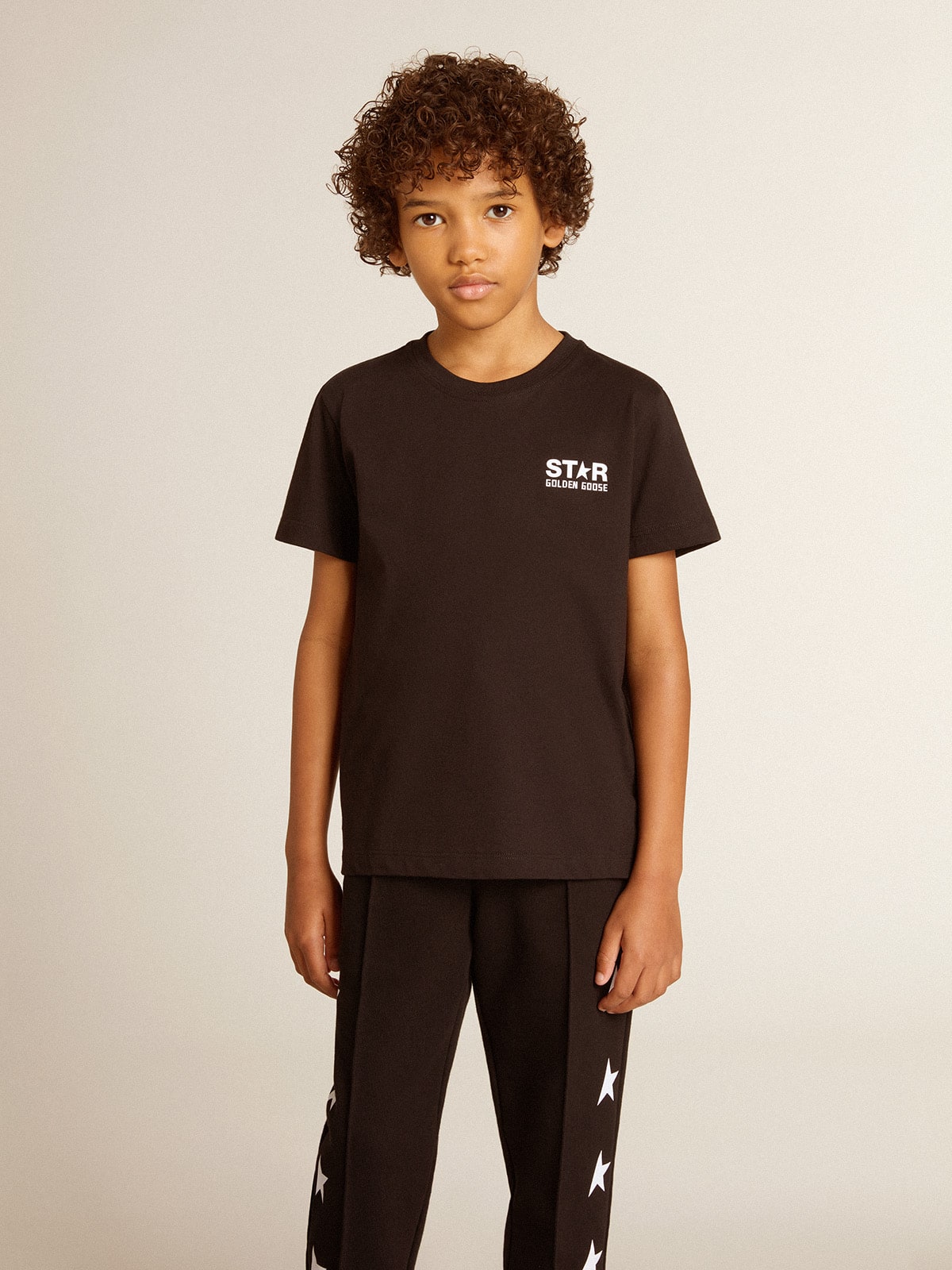 Golden Goose - Black T-shirt with contrasting white logo on the front and maxi star on the back in 