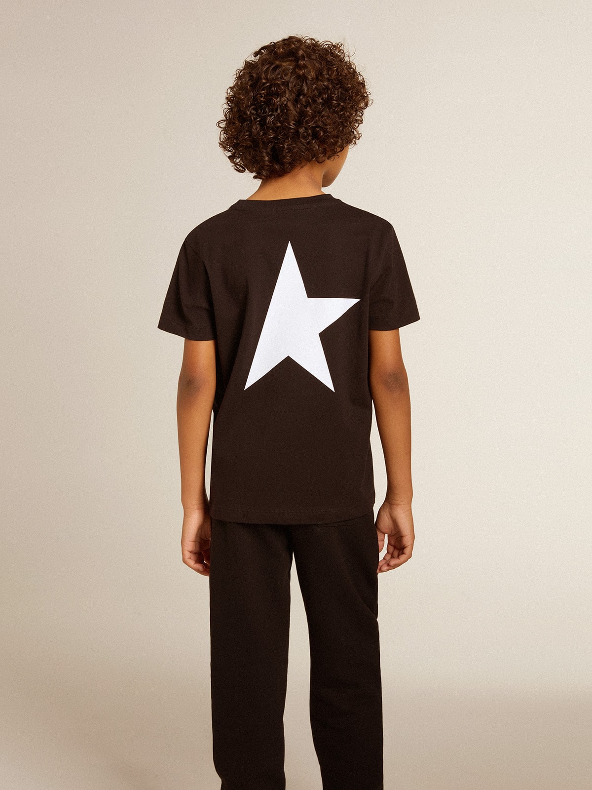 Golden Goose - Black T-shirt with contrasting white logo on the front and maxi star on the back in 