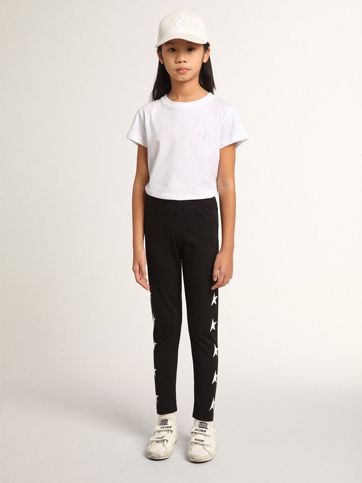 Golden Goose - Calça de legging infantil feminina preta com estrelas brancas nas laterais in 