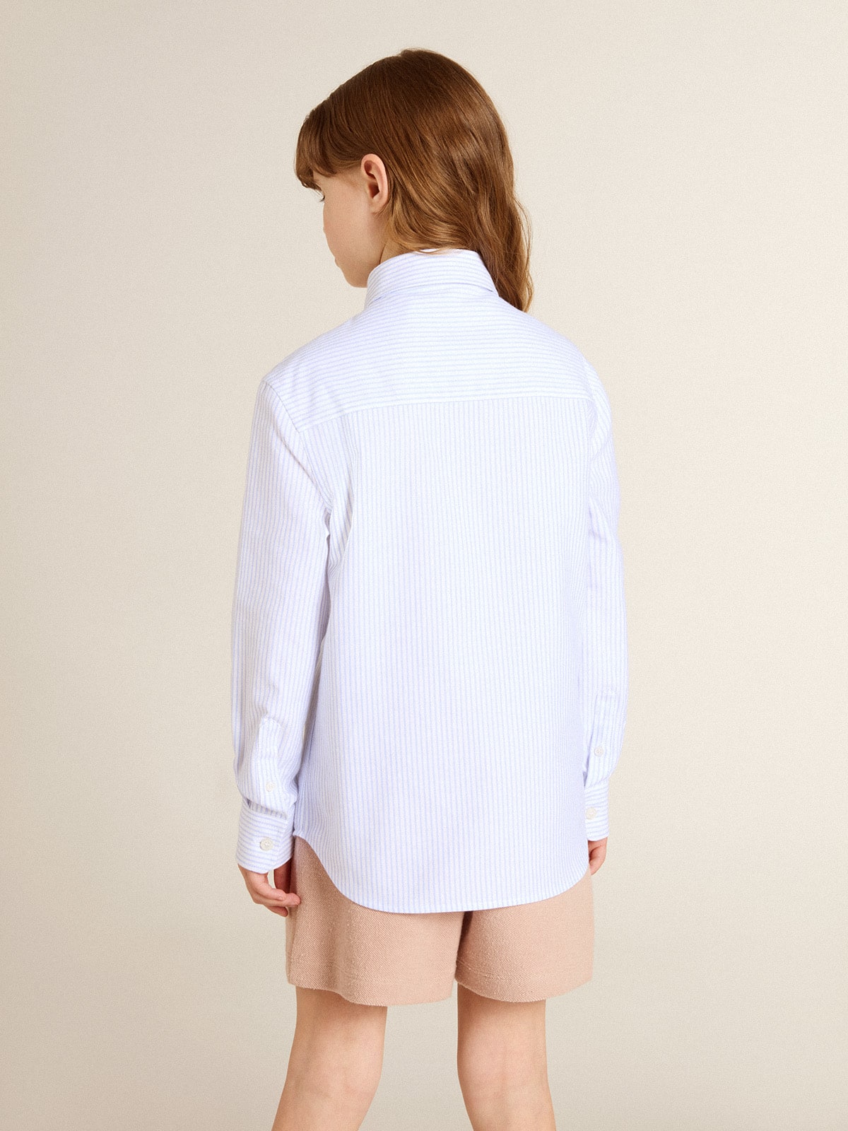 Girls' striped shirt with embroidered lettering on the Girls' striped shirt with embroidered lettering on the