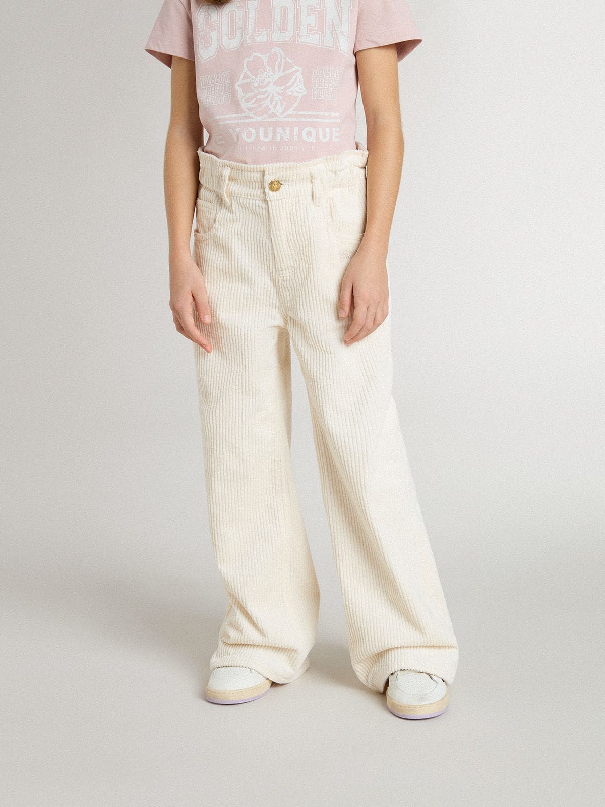 Pantalone ampio da bambina a costine color panna con ricamo