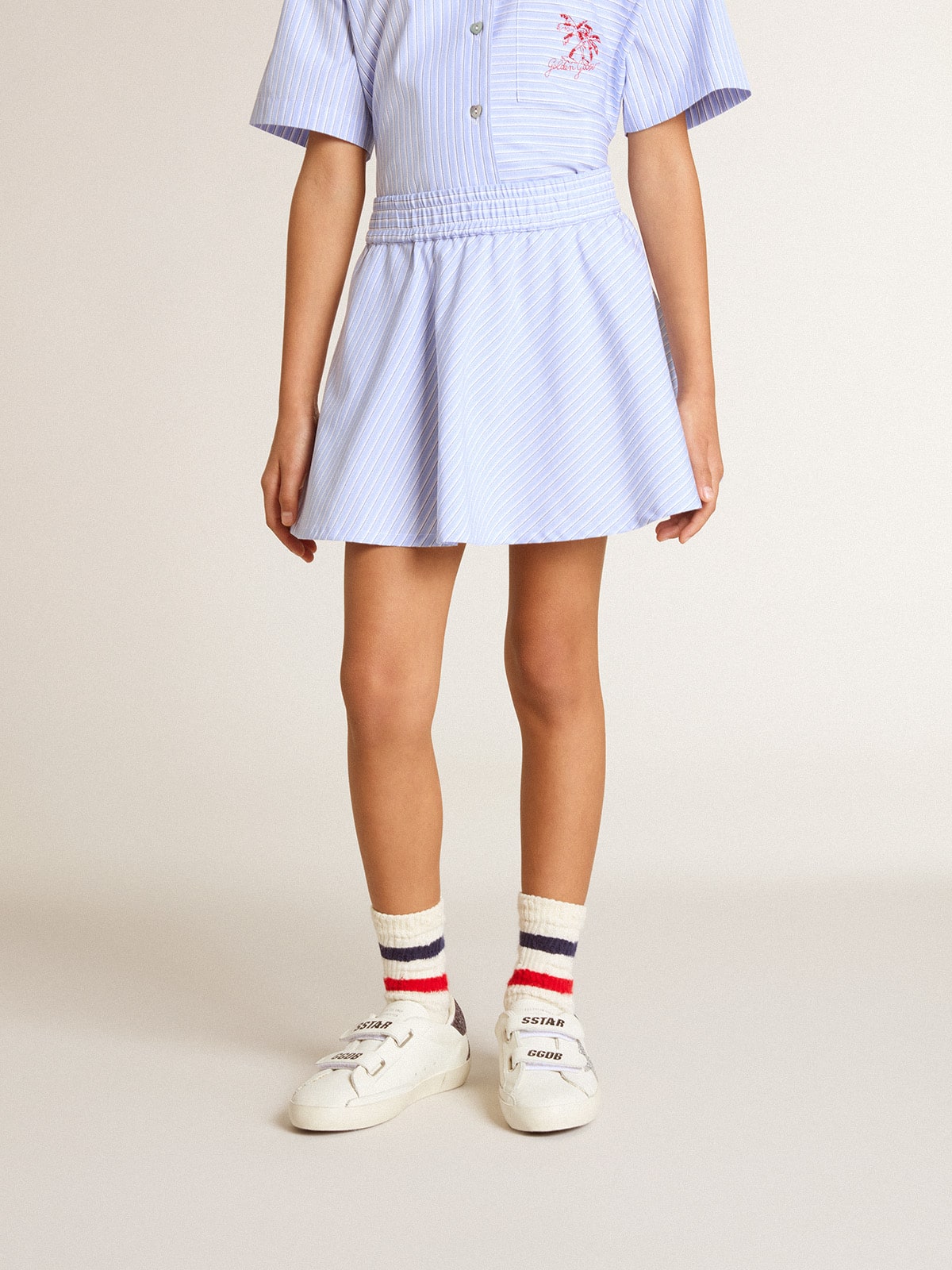 Girls' skirt with light blue stripes 