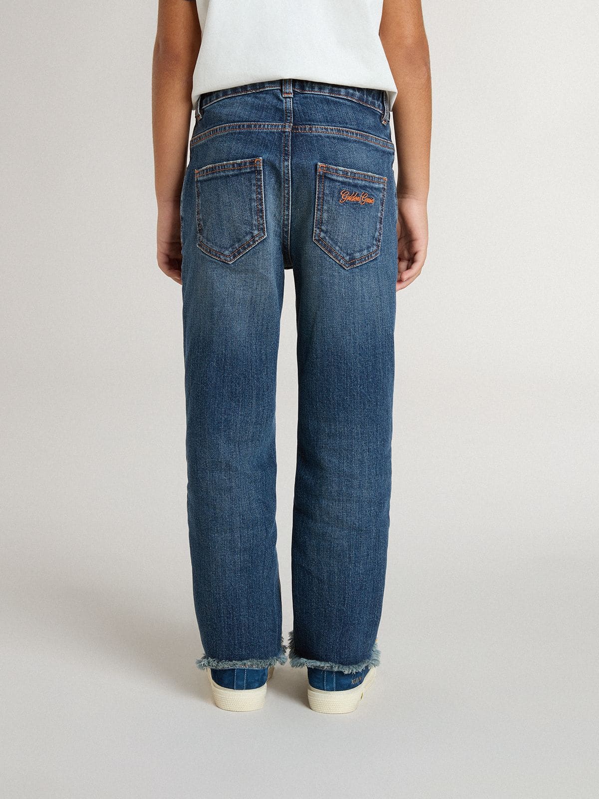 Golden Goose - Pantalón vaquero de niño en denim con corte sin rematar y bordado in 