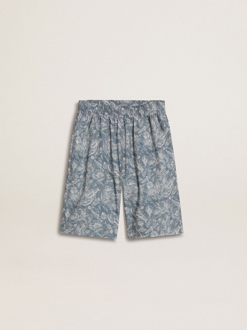 Boys’ blue shorts with white print 