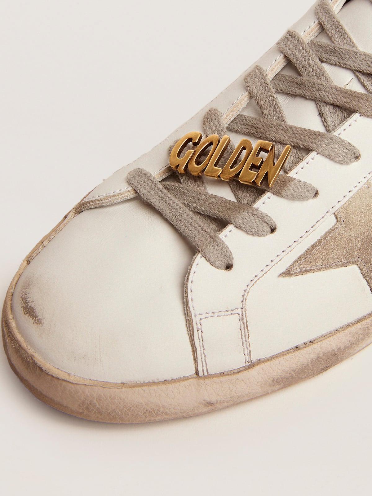 Golden Goose - Pasacordones con clip color oro viejo con mensaje Golden para hombre in 