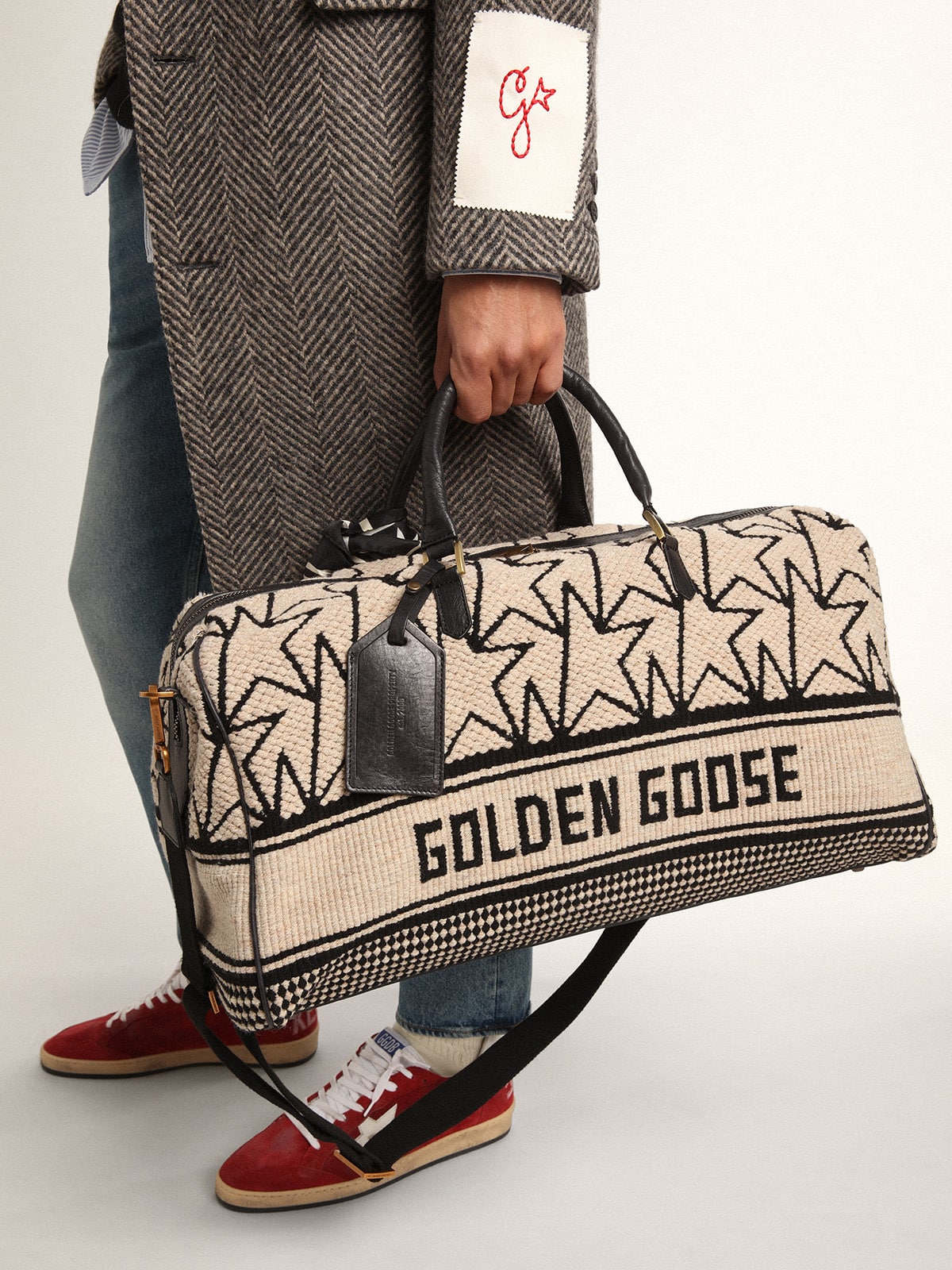 Golden Goose - Men's duffle bag in milk-white jacquard wool and black lettering in 