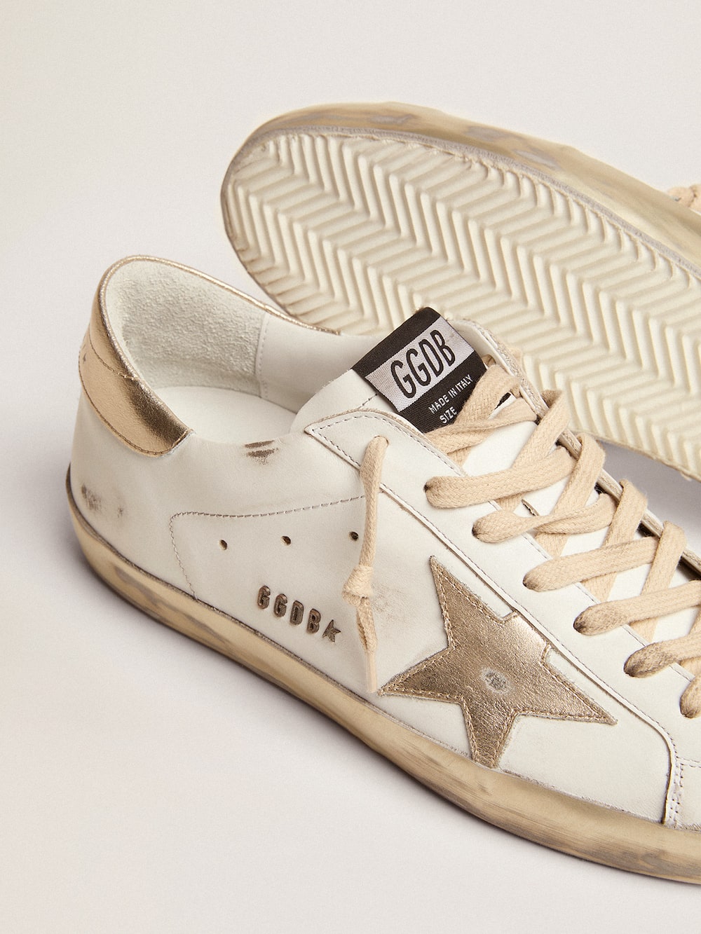 Golden Goose - Men's Super-Star with gold sparkle foxing and lettering in 
