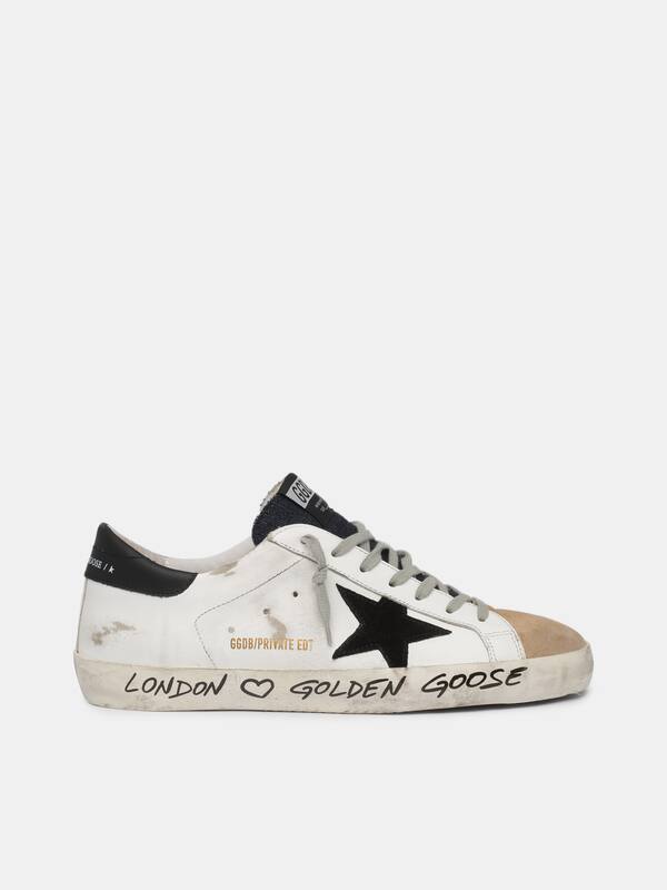 White and beige Super-Star sneakers with handwritten wording