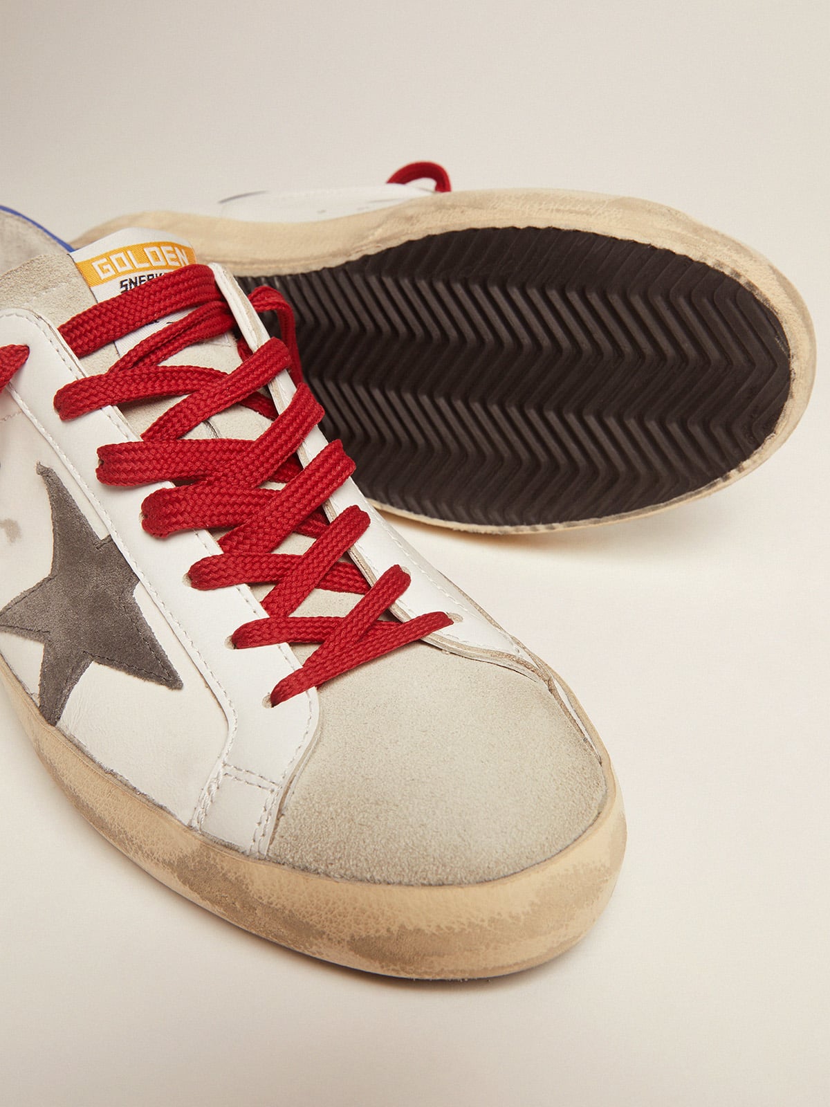 Golden Goose - Super-Star sneakers with blue heel tab and red laces in 