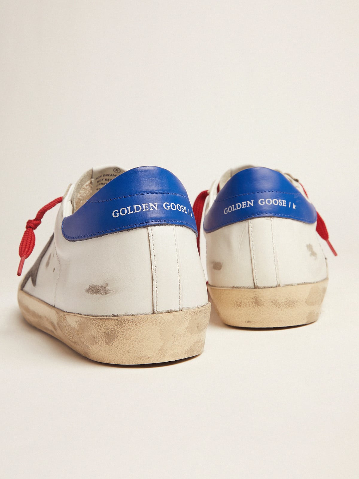 Golden Goose - Super-Star sneakers with blue heel tab and red laces in 