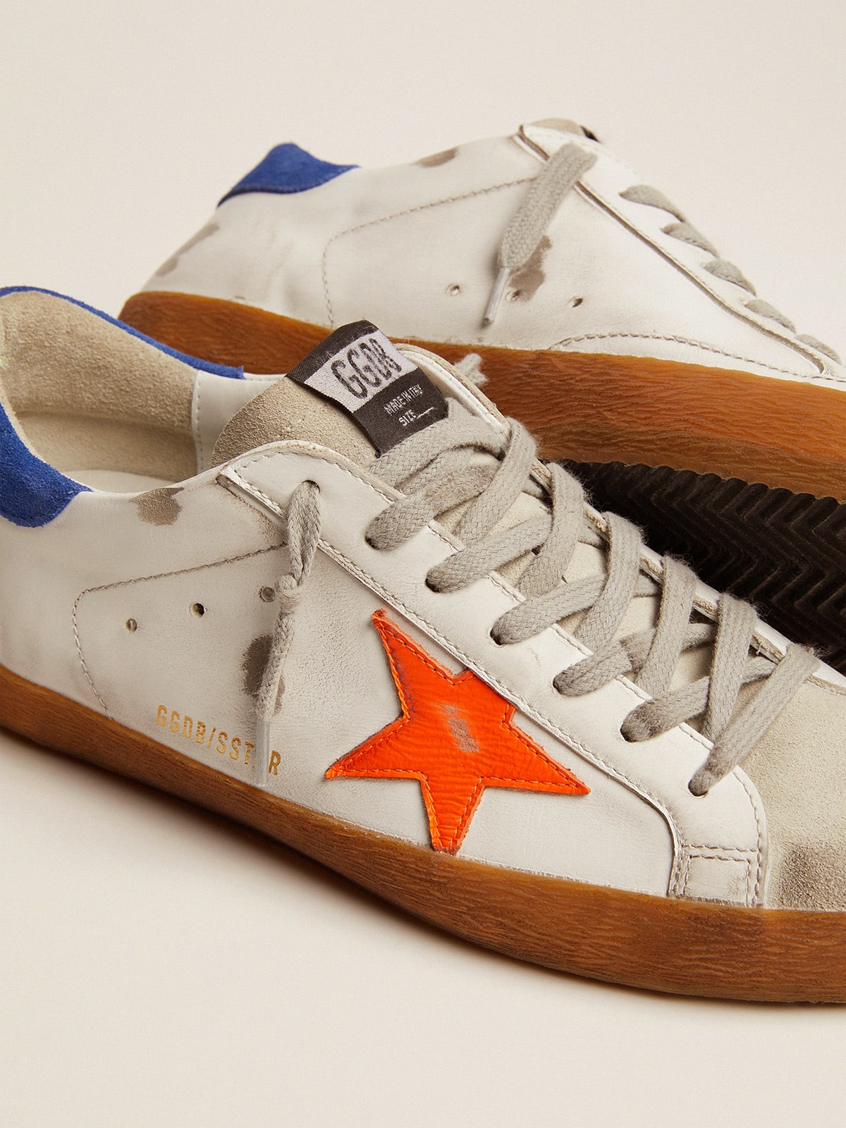 Golden Goose - Super-Star sneakers with blue suede heel tab and neon orange star in 