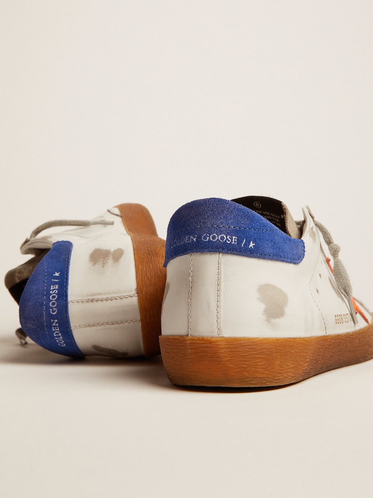 Golden Goose - Super-Star sneakers with blue suede heel tab and neon orange star in 
