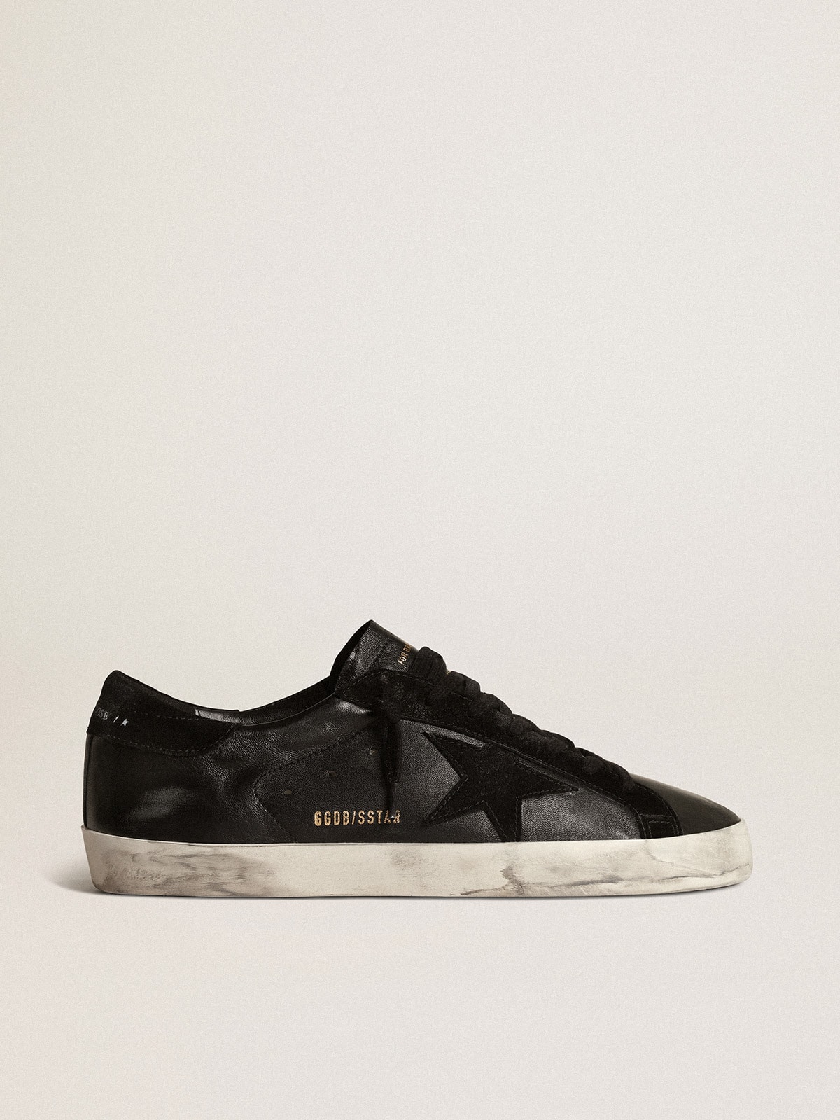 Super Star Uomo in nappa nera con stella e talloncino in suede nero Golden Goose