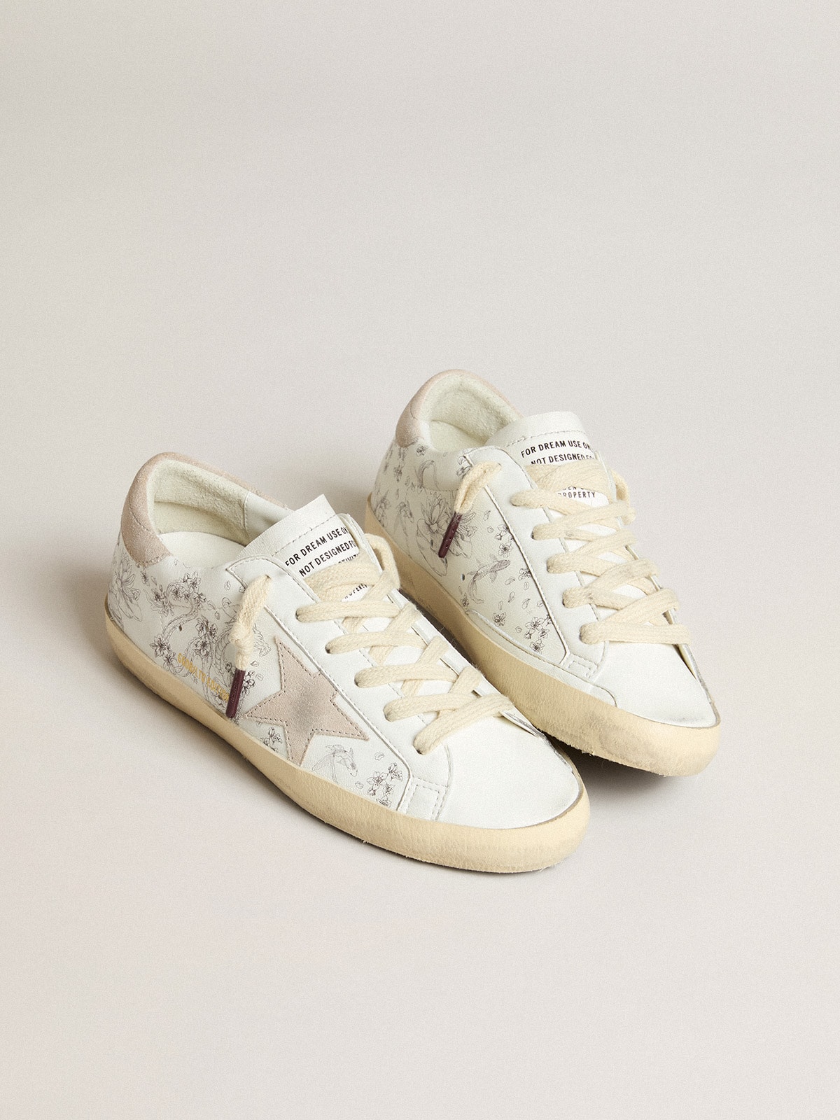 Golden Goose - Super-Star Uomo LTD CNY in pelle bianca con scritte sulla tomaia in 