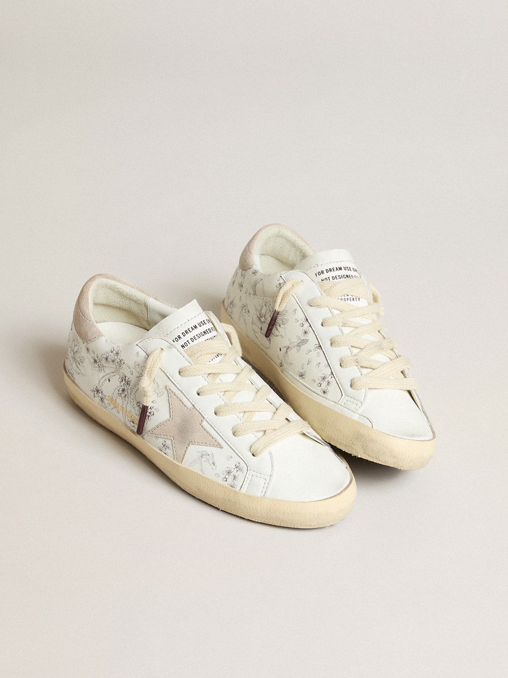 Golden Goose - Men’s Super-Star LTD CNY in white leather with lettering on the upper in 