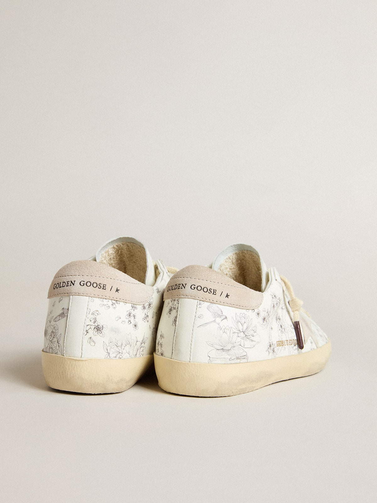 Golden Goose - Super-Star Uomo LTD CNY in pelle bianca con scritte sulla tomaia in 