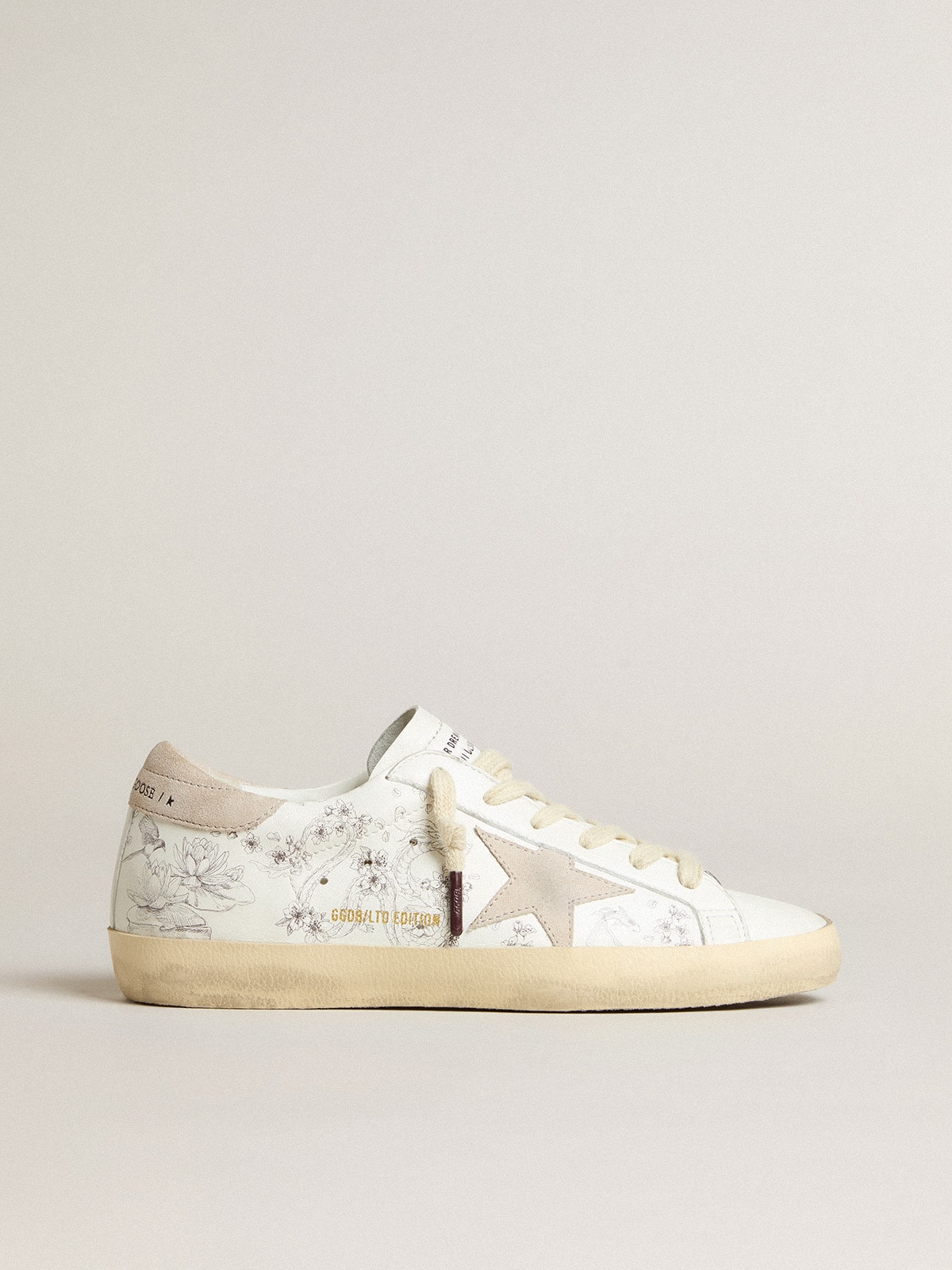 Golden Goose - Men’s Super-Star LTD CNY in white leather with lettering on the upper in 