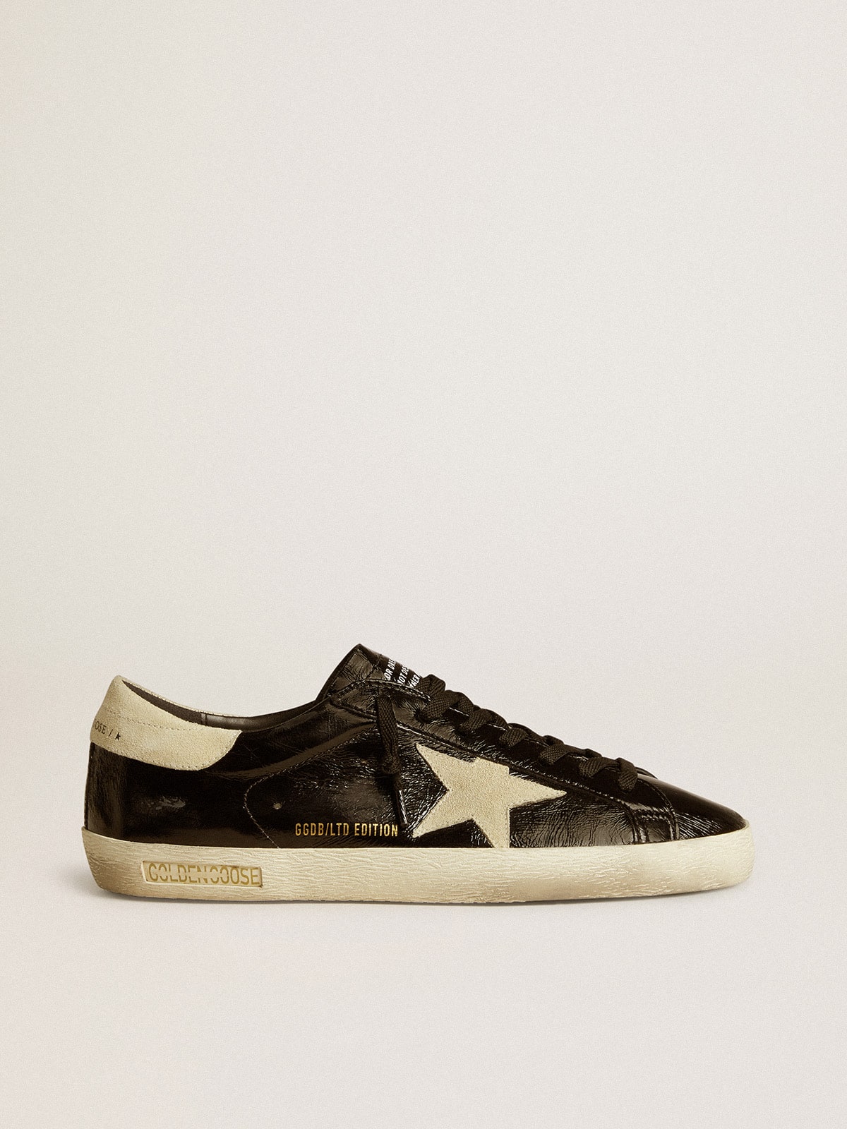 Super Star Uomo LTD in pelle verniciata nera con stella e talloncino in suede Golden Goose