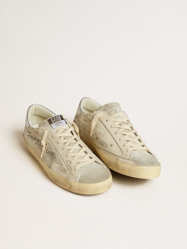Men's Super-Star LTD in white leather with all-over lettering and ice-gray suede star