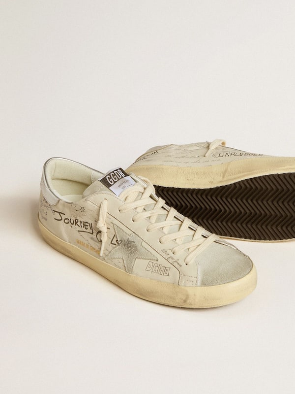 Men's Super-Star LTD in white leather with all-over lettering and ice-gray suede star