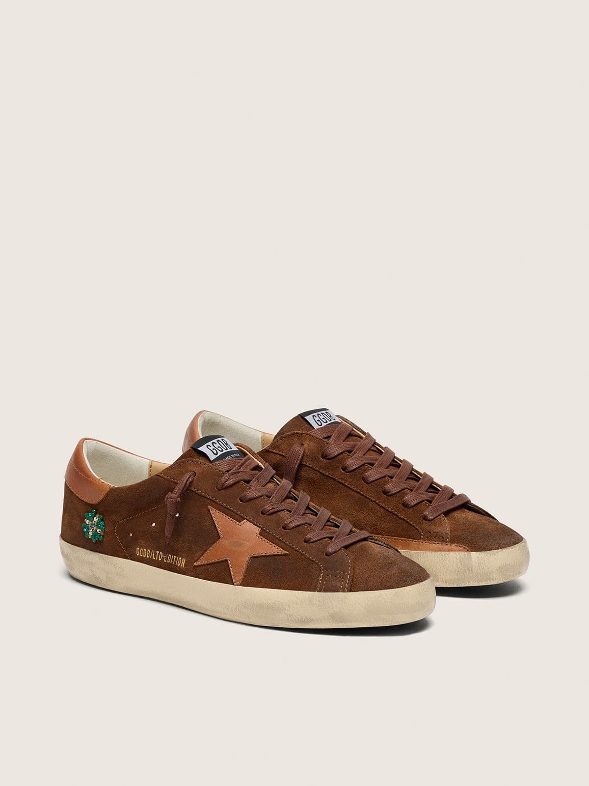 Men&rsquo;s Super-Star LTD in brown suede with brick-red leather star and embroidery with green beads