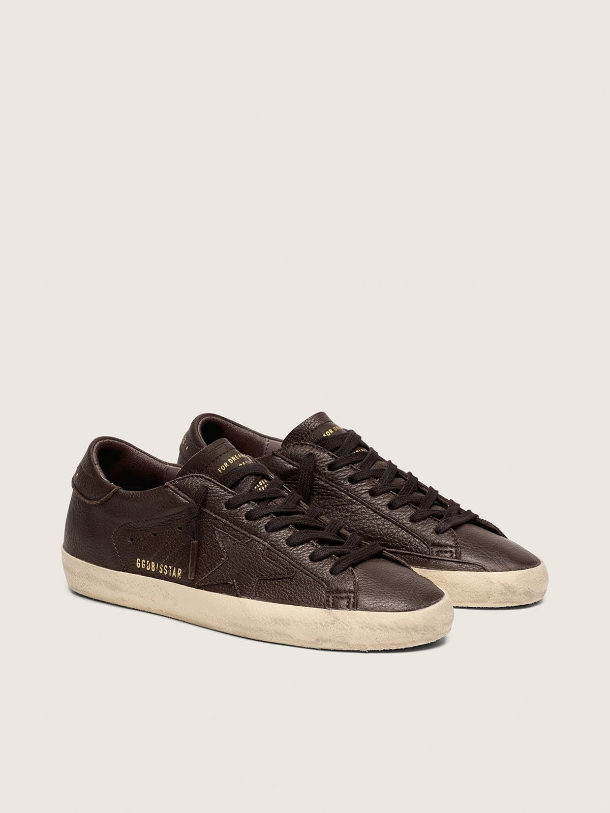 Super-Star uomo in pelle marrone scuro con stella  in pelle ton sur ton