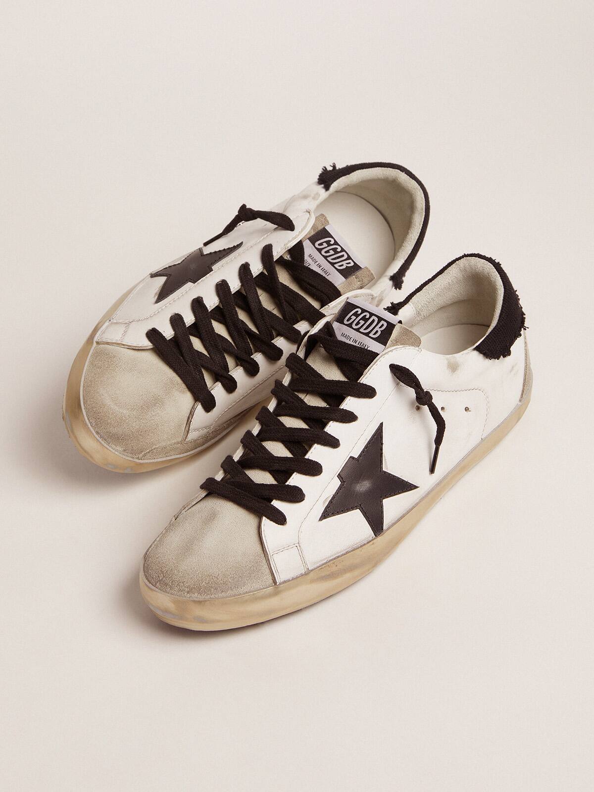 Golden Goose - Super-Star sneakers in white leather with black distressed canvas heel tab in 
