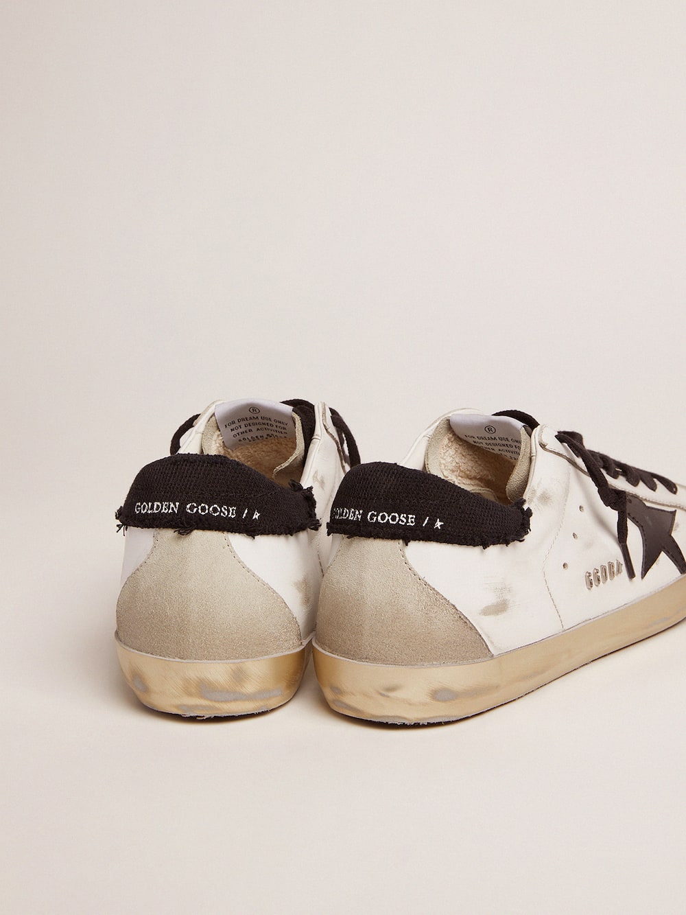 Golden Goose - Super-Star sneakers in white leather with black distressed canvas heel tab in 