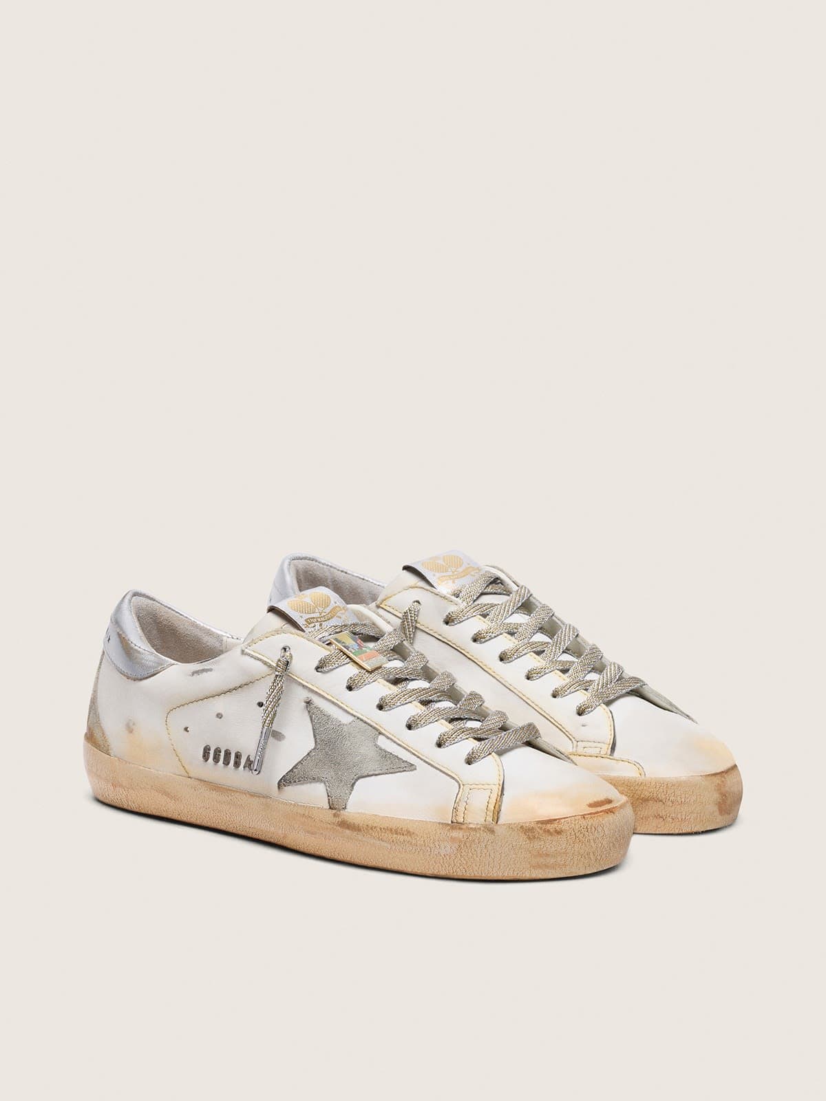 Golden Goose - Super-Star masculino tennis-inspired de couro branco com estrela de suede cinza in 