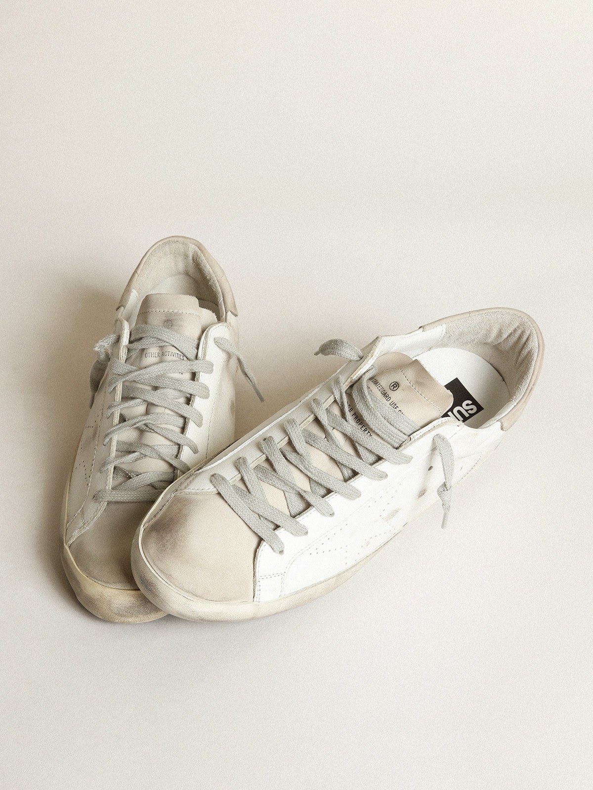 Men s Super Star with perforated star and ice gray heel tab Golden Goose