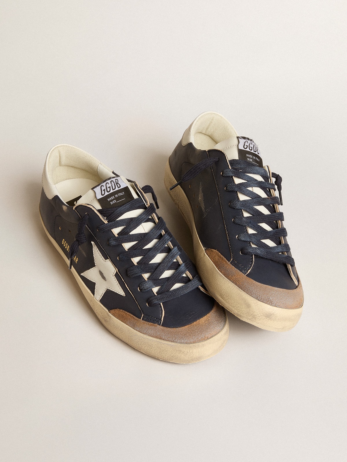 Golden Goose - Super-Star Uomo in nappa blu con stella e talloncino in pelle bianca in 