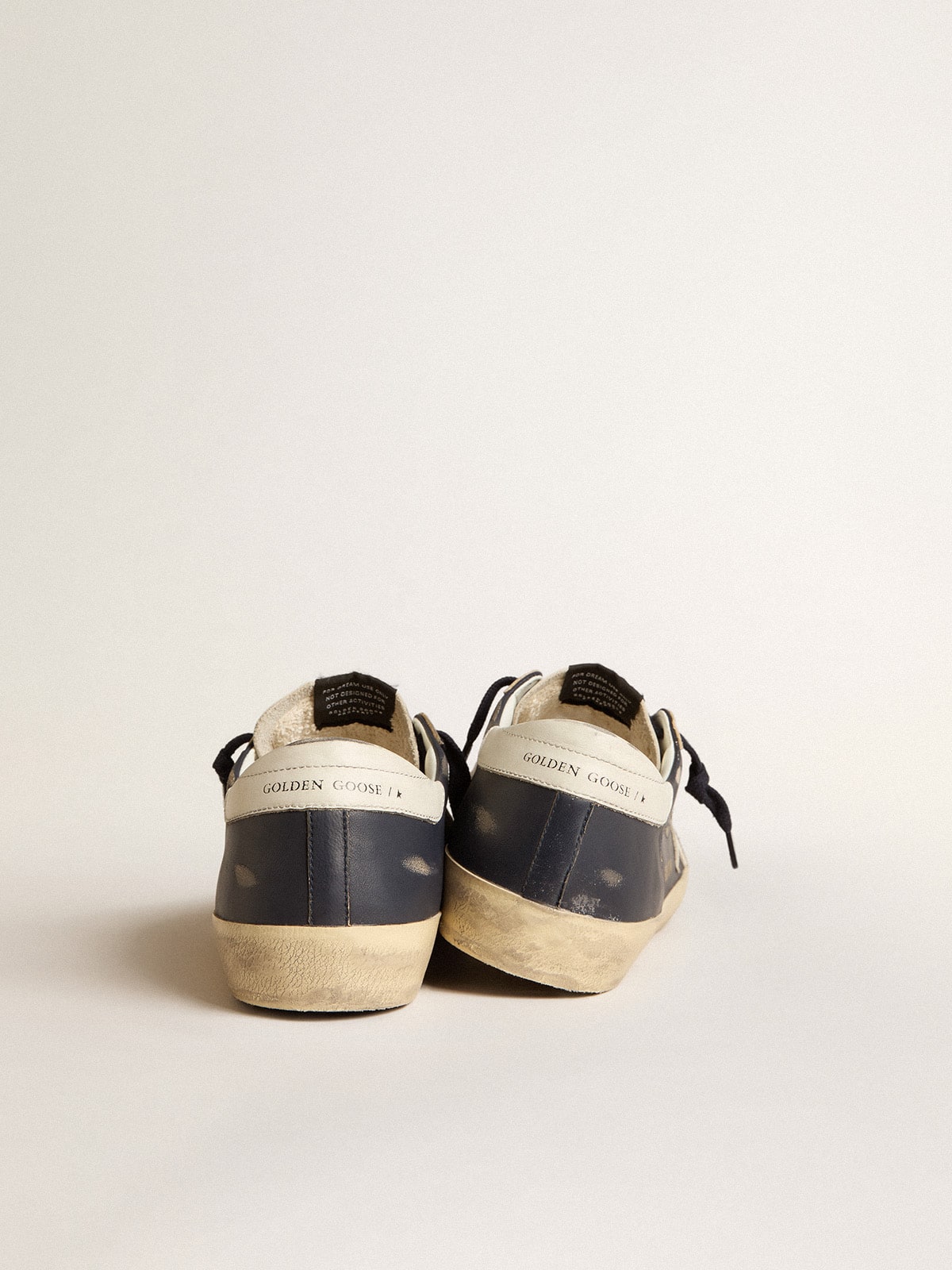 Golden Goose - Super-Star Uomo in nappa blu con stella e talloncino in pelle bianca in 