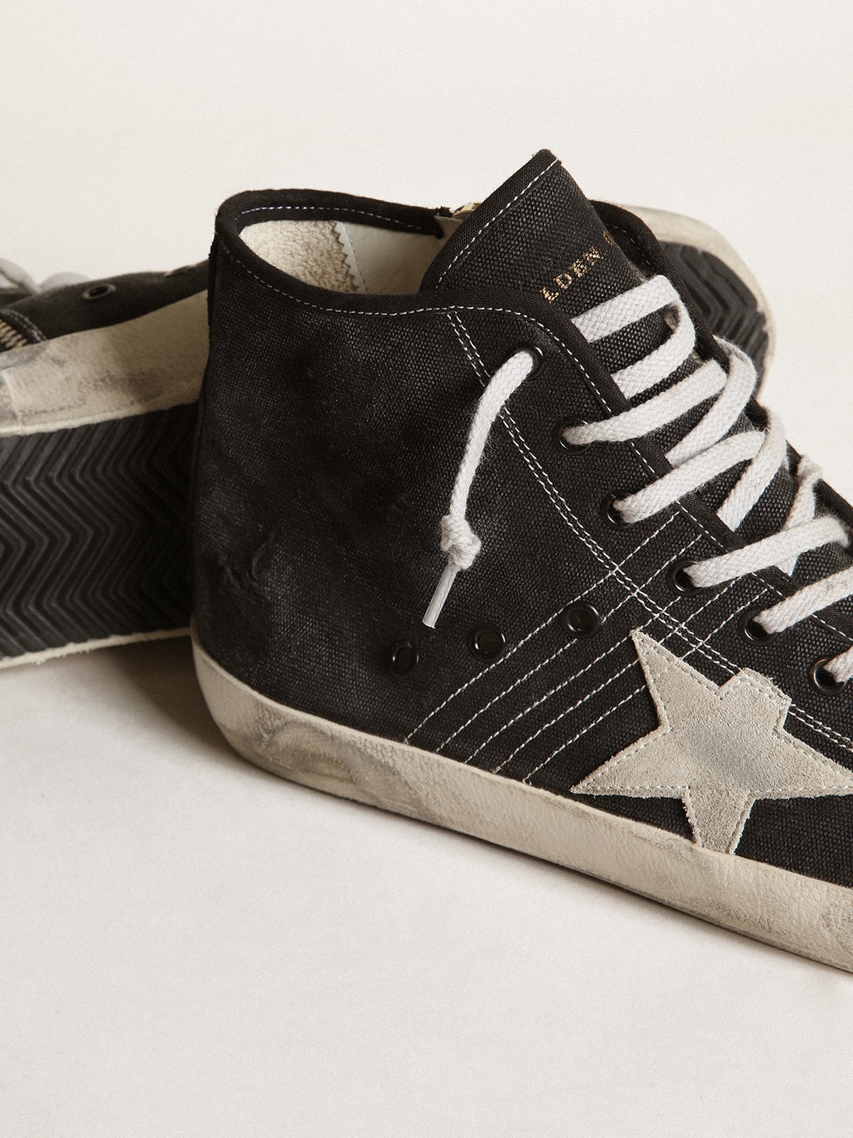 Francy Penstar in black canvas with white suede star and black suede heel tab Golden Goose