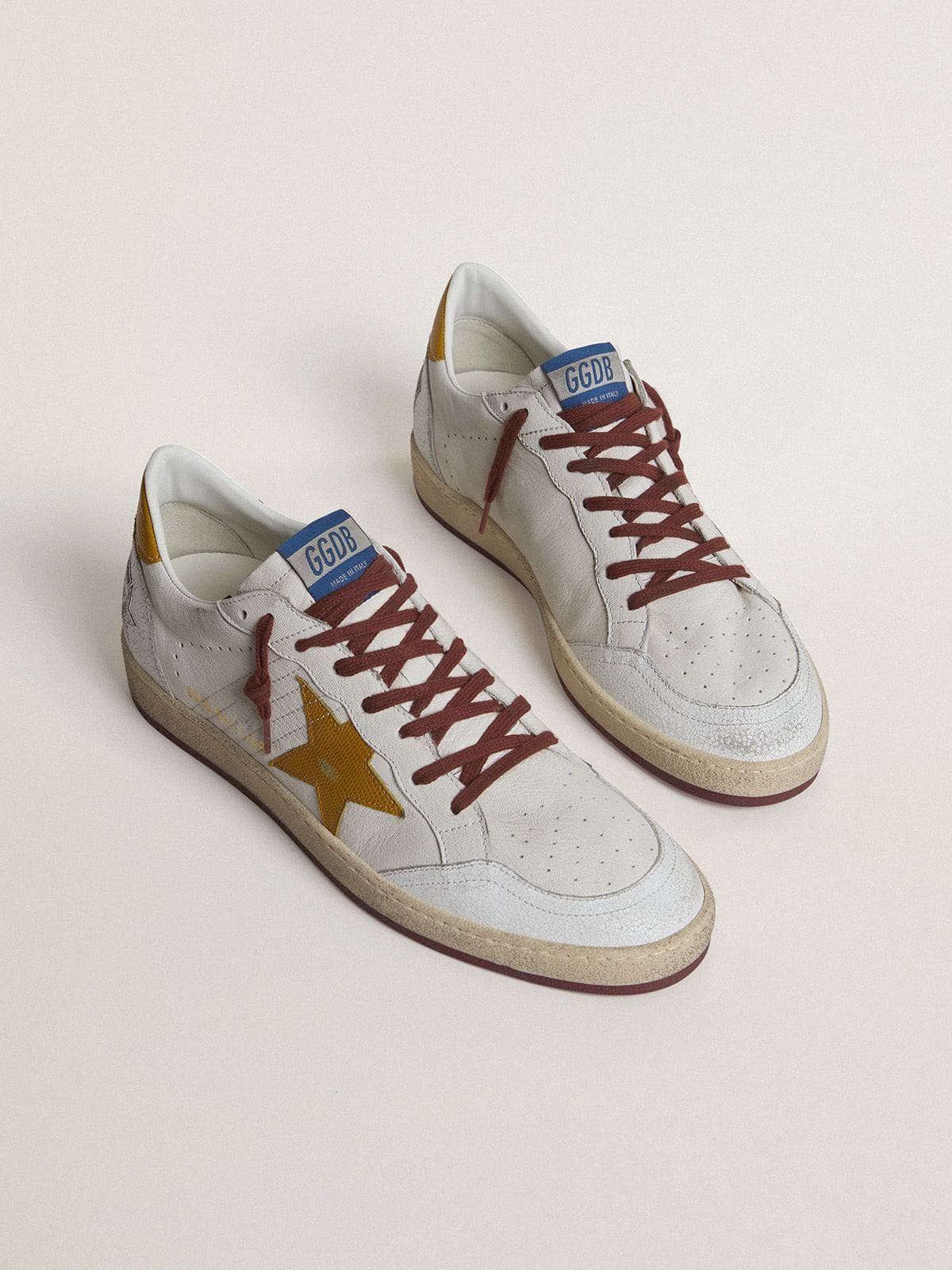 Golden Goose - Men's Ball Star in white nappa leather with yellow animal-print leather star and heel tab in 