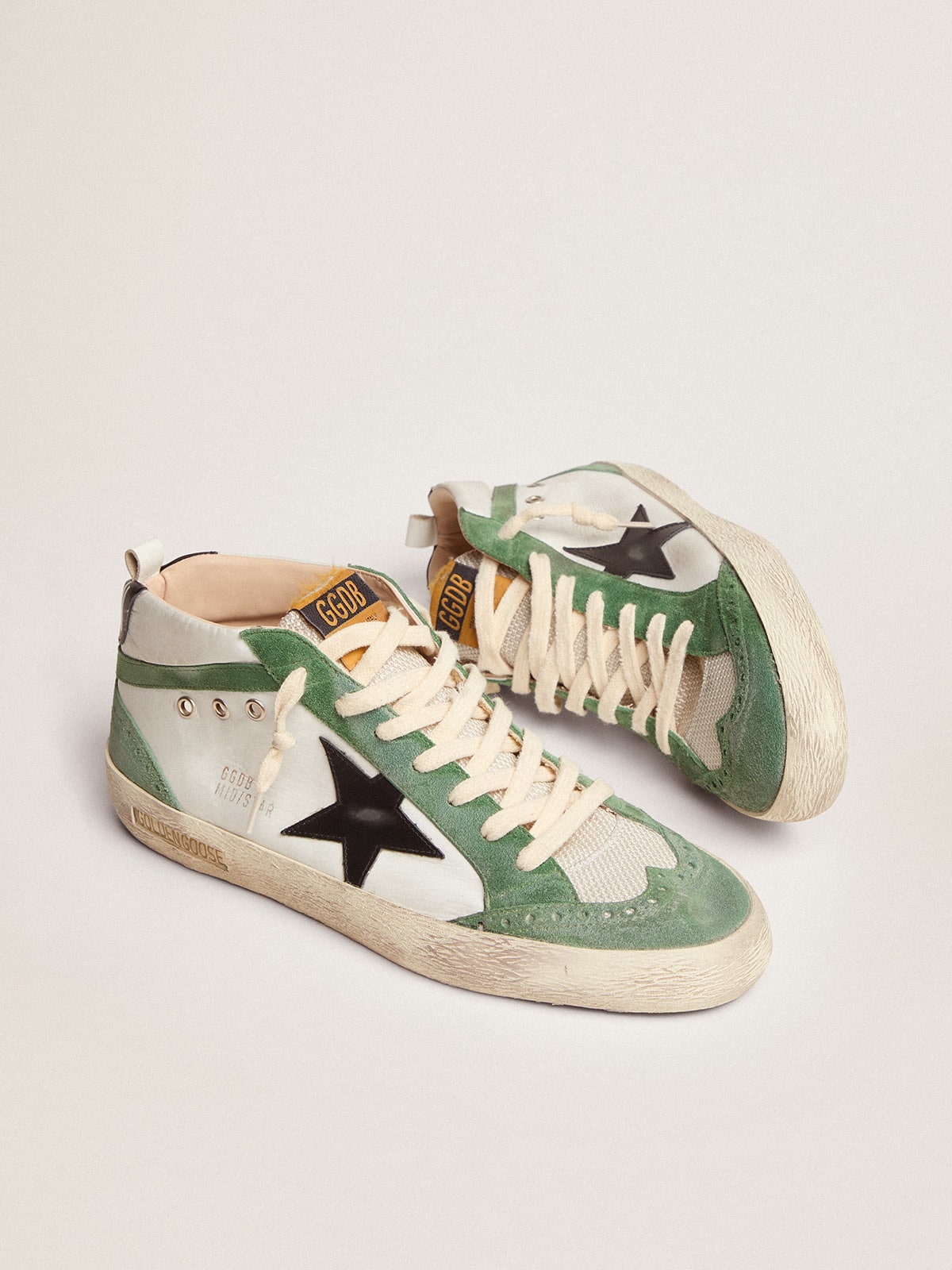 Golden Goose - Men's Mid Star LTD with black leather star and green flash in 