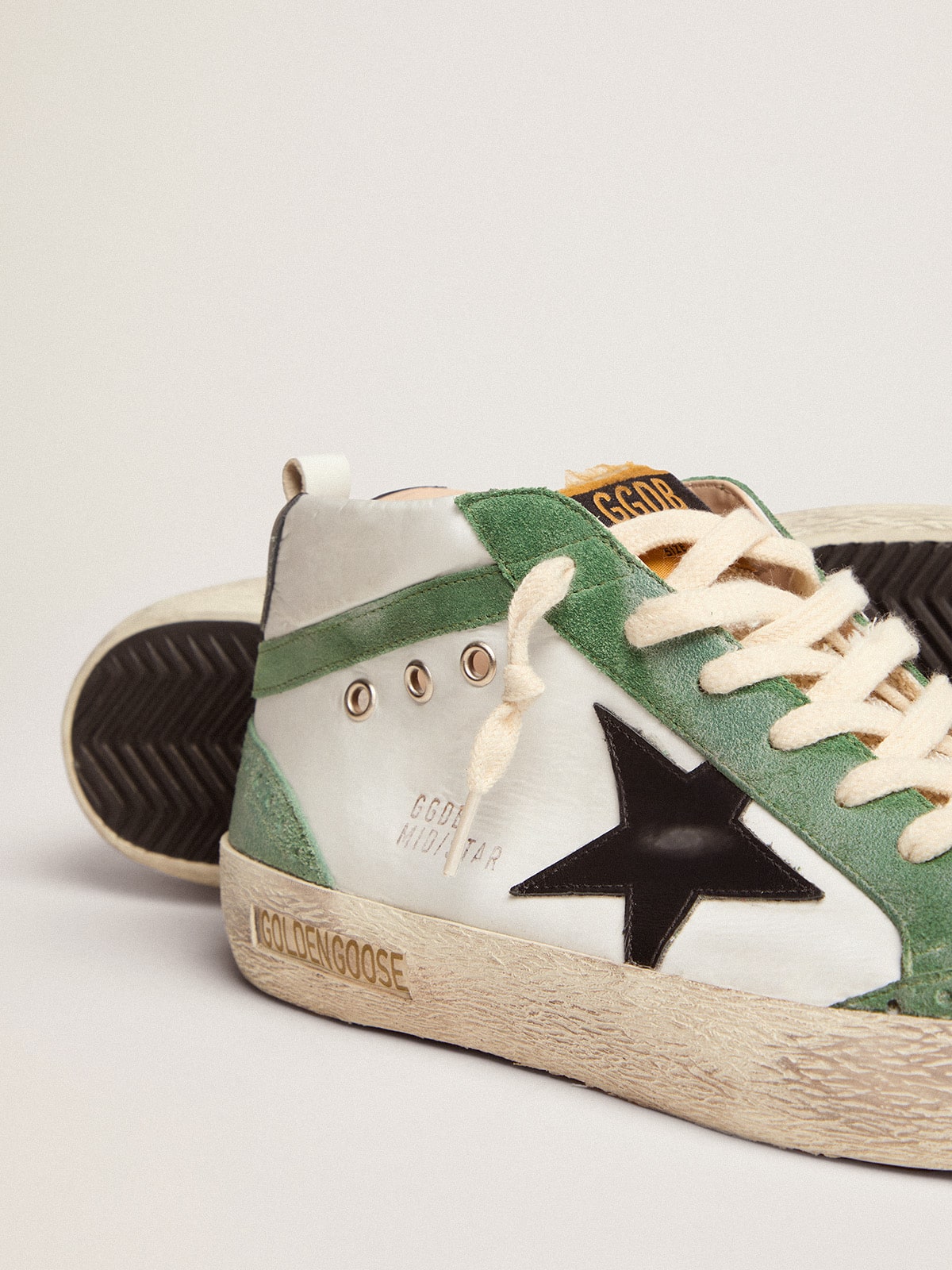 Golden Goose - Men's Mid Star LTD with black leather star and green flash in 