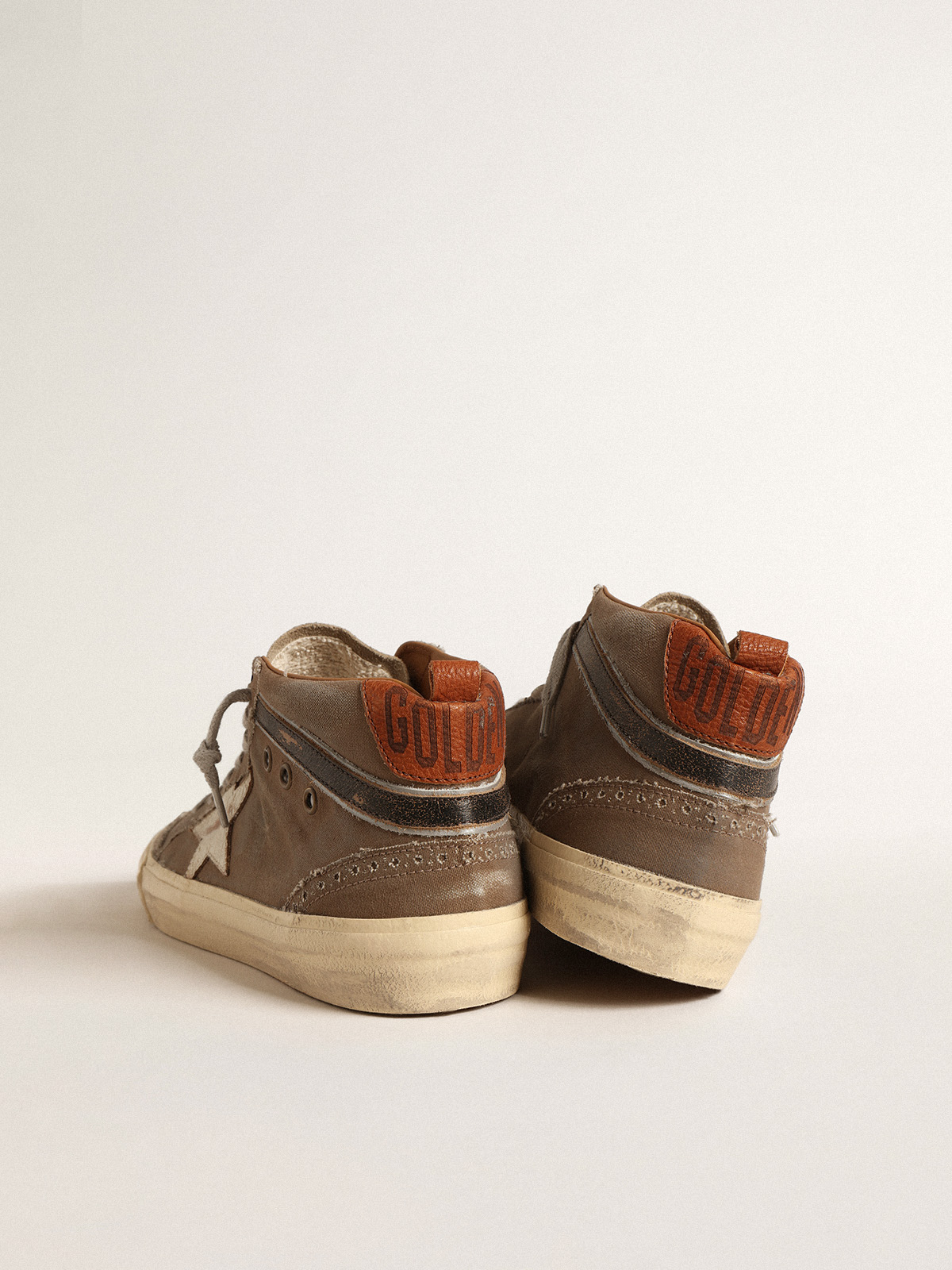 Golden Goose - Mid Star in green canvas with leather star and black flash in