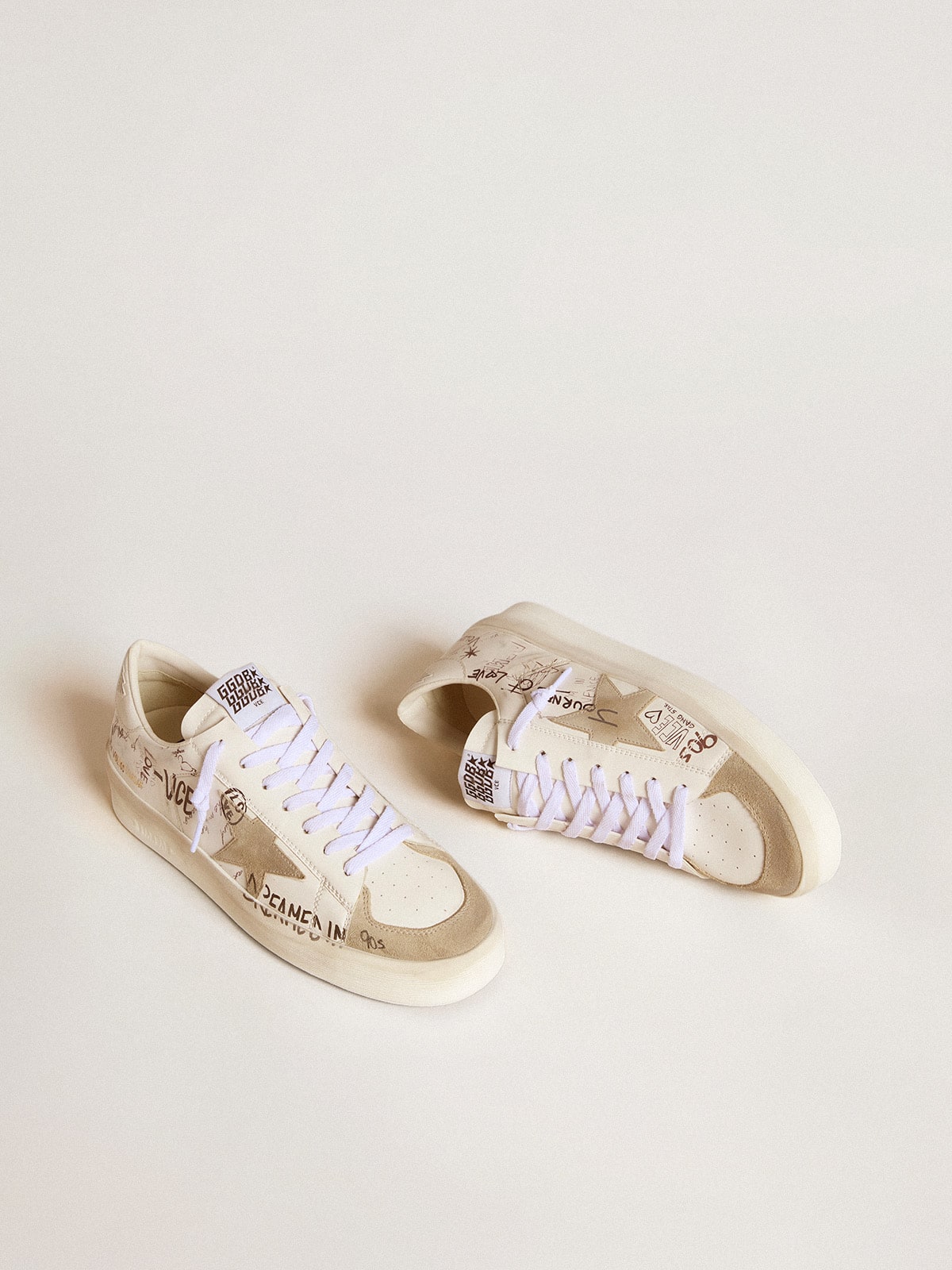 Stardan in leather with all-over lettering and ice-gray
