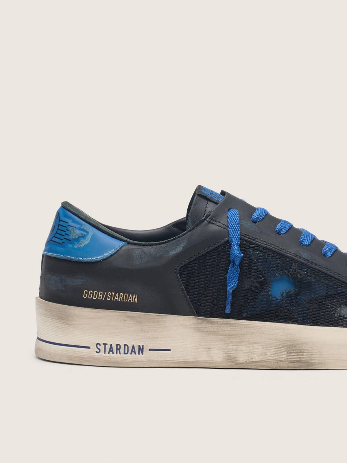 Golden Goose Men's Stardan in black leather with blue star and black distressed mesh Stardan black man