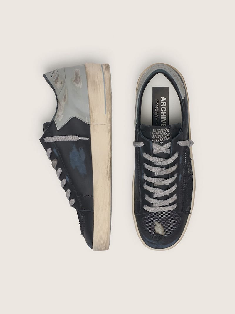 Golden Goose - Stardan homme en cuir noir avec &eacute;toile grise et r&eacute;sille noire effet us&eacute; in 