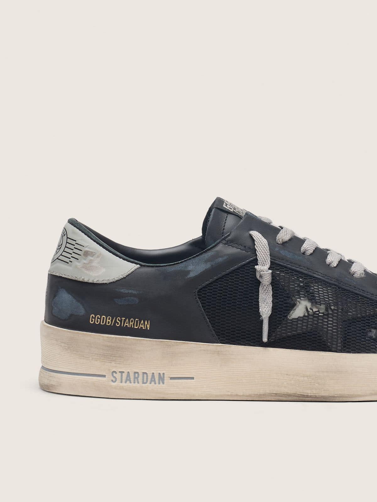 Golden Goose Men's Stardan in black leather with gray star and black distressed mesh Stardan black man
