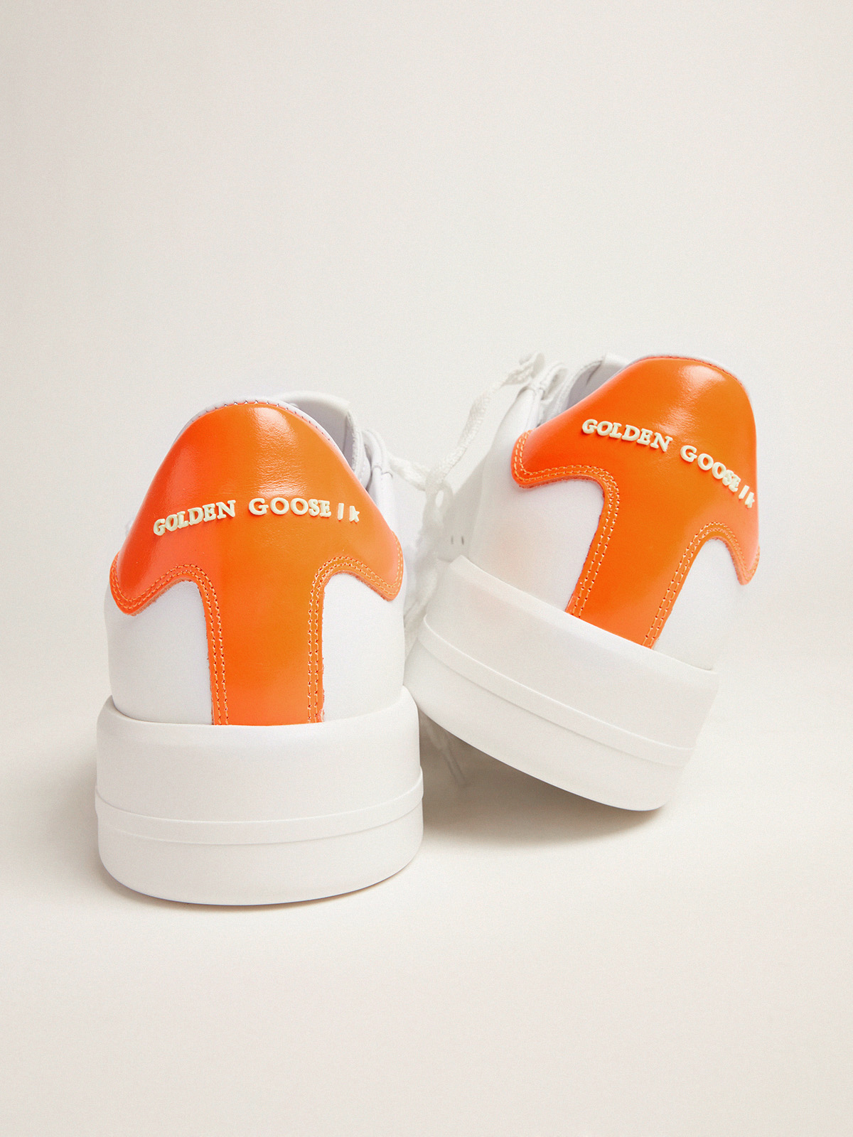 Golden Goose - White Purestar sneakers with fluorescent orange heel tab in