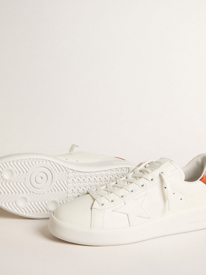 Golden Goose - Purestar de hombre con estrella de piel blanca y refuerzo del tal&oacute;n naranja in 