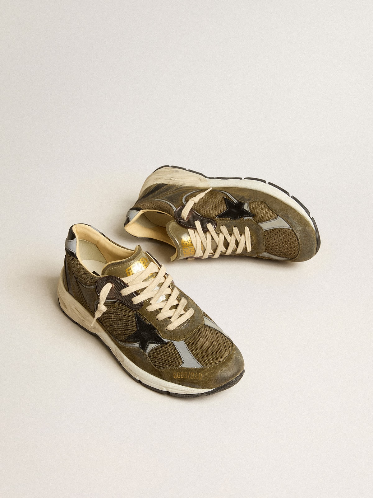 Men s Dad Star in suede and mesh with black leather star and heel tab Golden Goose