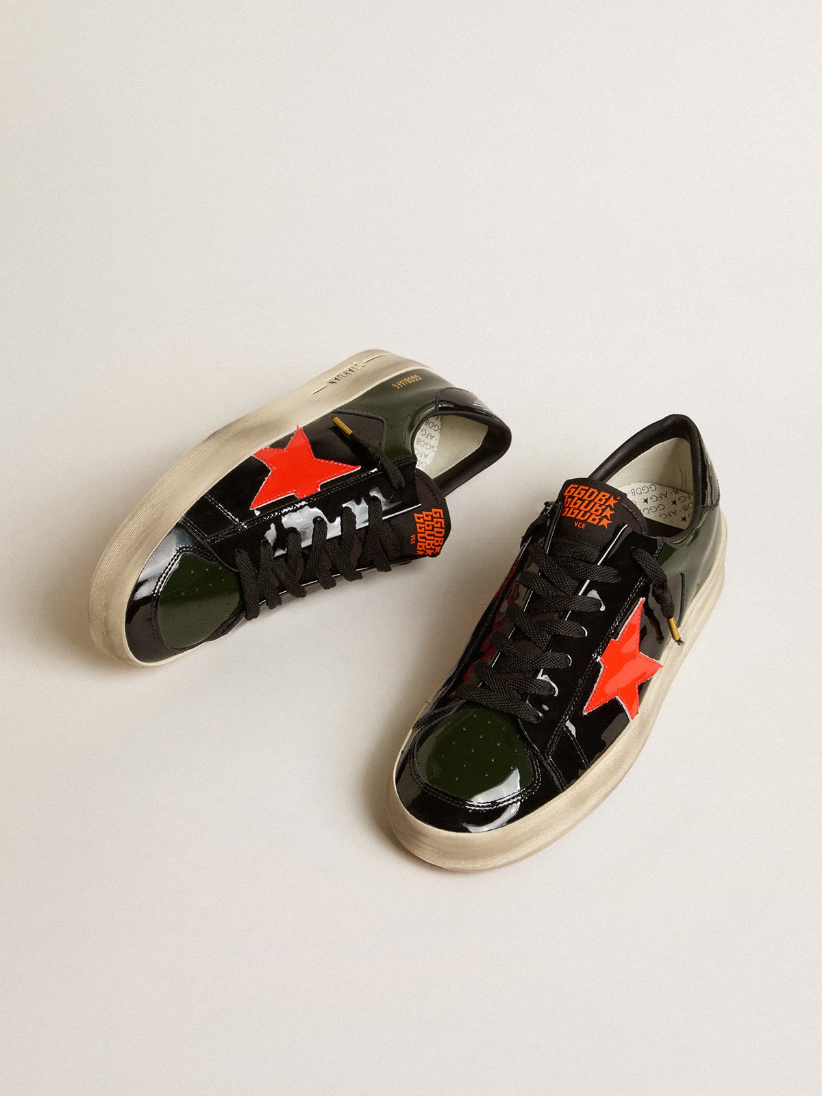 Golden Goose - Stardan LAB Herren aus schwarzem und grünem Lackleder mit orangefarbenem Stern in 