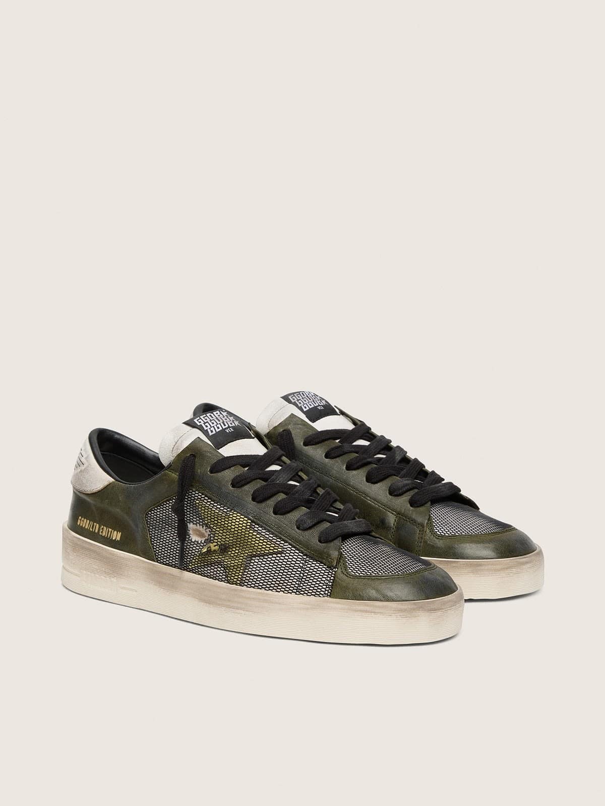 Golden Goose - Stardan LTD uomo in pelle bianca e verde oliva con rete nera e stella in pelle gialla in 
