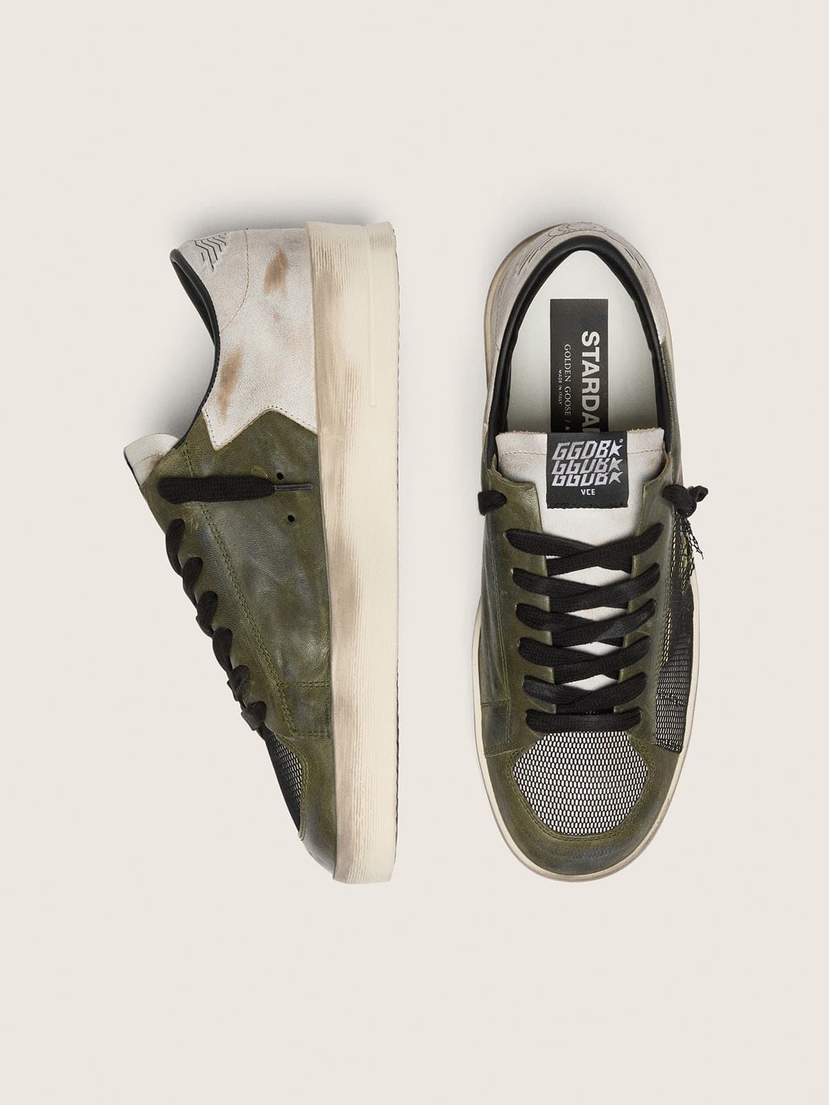 Golden Goose - Stardan LTD uomo in pelle bianca e verde oliva con rete nera e stella in pelle gialla in 