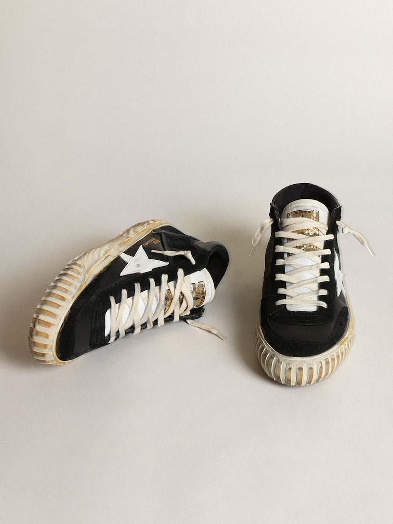 Golden Goose - Schwarzer Mid Star Herren aus Nappa- & Rauleder mit wei&szlig;em Stern in 