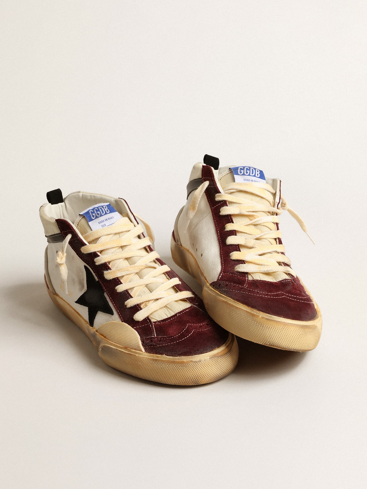 Golden Goose - Mid Star en nappa avec étoile en daim noir et empiècements lie-de-vin in 