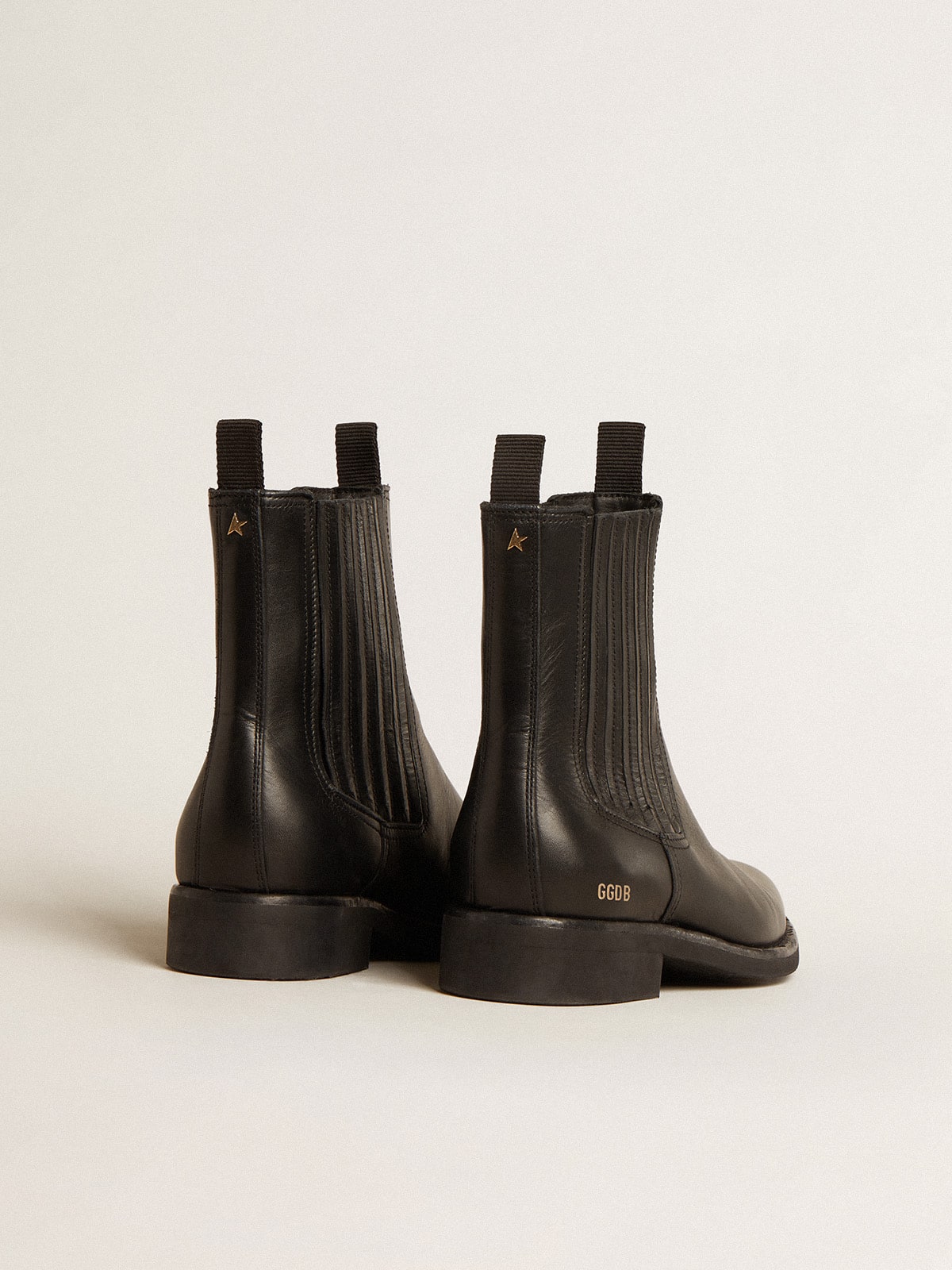 Golden goose black boots online